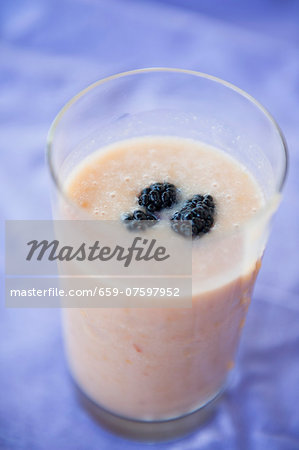 Peach milkshake with blackberries Peach milkshake with blackberries