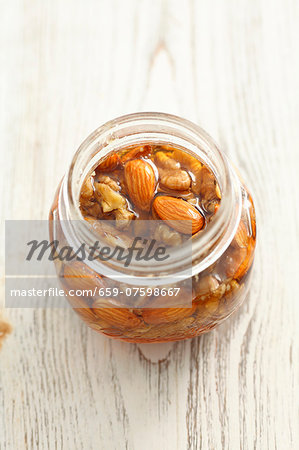 Walnuts and almonds in honey Walnuts and almonds in honey