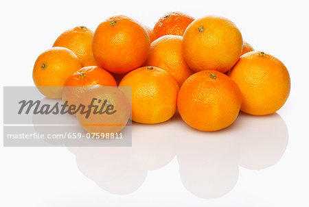 Several whole clementines