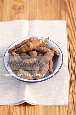 Jerusalem artichokes in a bowl Jerusalem artichokes in a bowl