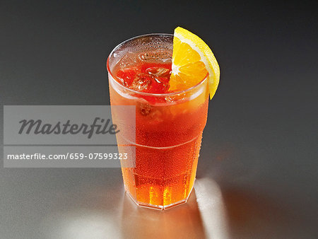 A glass of iced tea with lemon A glass of iced tea with lemon