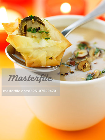 Cream of chestnut soup with hazelnuts and crispy ceps