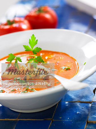 Cream of tomato soup with seafood