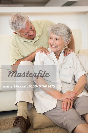 Senior man giving his partner a shoulder massage