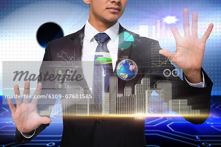 Businessman touching interface with graphics