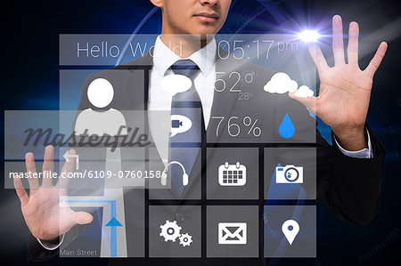 Businessman touching app interface with graphics