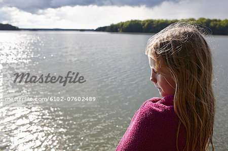 Girl looking at water, Skane, Sweden