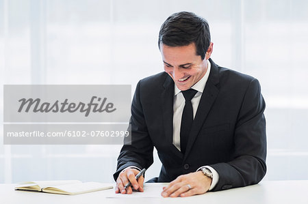 Businessman in office, Stockholm, Sweden