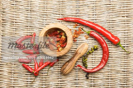 Chilli peppers in an olive wood mortar