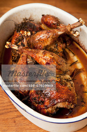 Roast pheasant in an oven dish