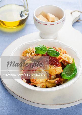 Tortellini with tomato sauce, basil and Parmesan