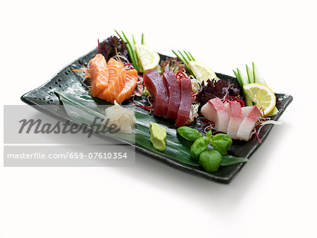 Raw fish with ginger and wasabi paste