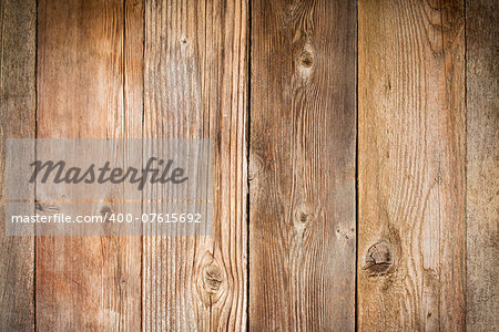 rustic weathered wood background with grain and knots (vertical planks)