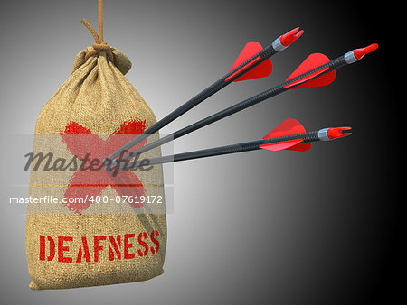 Deafness - Three Arrows Hit in Red Mark Target on a Hanging Sack on Grey Background.