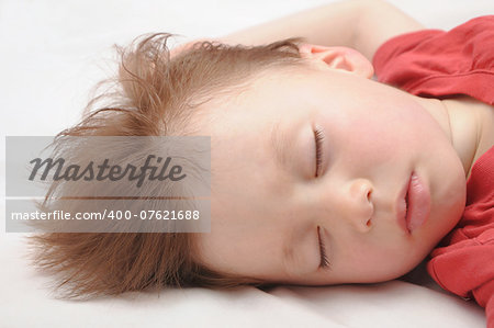 Caucasian white European kid sleeping 3 years old portrait