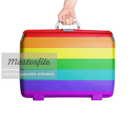 Used plastic suitcase with stains and scratches, printed with flag, rainbow flag