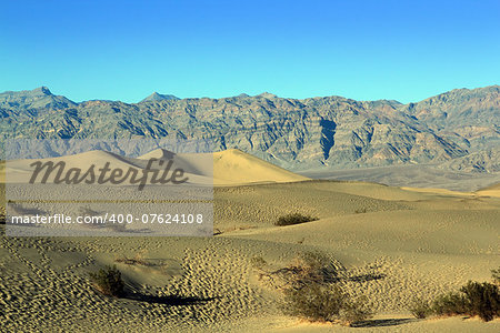 Sand Dunes, Ripples And Mountain Peaks, Death Valley National Park, California