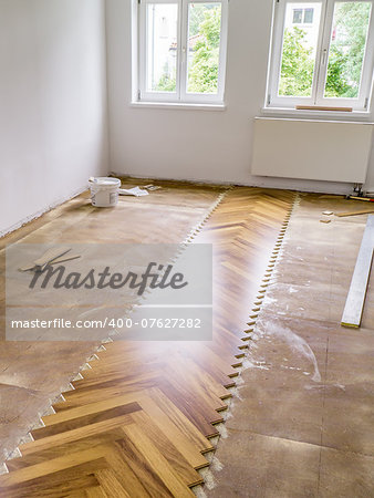 An image of laying a new parquet in the flat