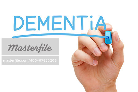 Hand writing Dementia with blue marker on transparent wipe board.