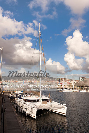 Catamaran moored in the port of Vigo, Pontevedra, Galicia, Spain.