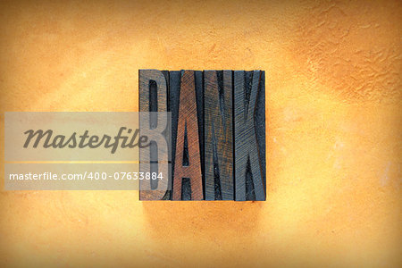 The word BANK written in vintage letterpress type