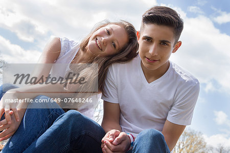Angled portrait of teenage couple