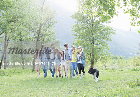 Group of eight young adult friends and their dog, Piemonte, Italy