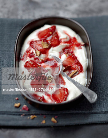 Fontainebleau with warm stewed strawberries and pink pralines Fontainebleau with warm stewed strawberries and pink pralines
