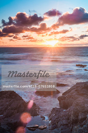 Rocky coast at Treyarnon Bay at sunset, Cornwall, England, United Kingdom, Europe Rocky coast at Treyarnon Bay at sunset, Cornwall, England, United Kingdom, Europe