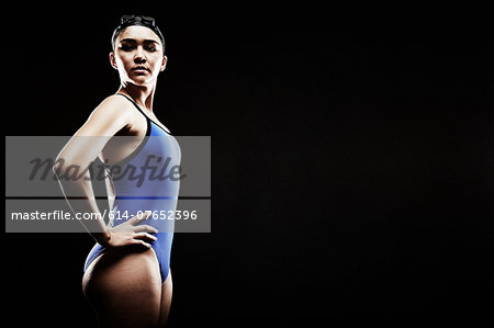 Young woman wearing blue swimsuit