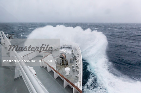 The Lindblad Expeditions ship National Geographic Explorer in heavy seas in the Drake Passage, Antarctica, Polar Regions