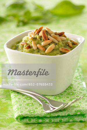 Zucchini mousse with pesto and pine nuts