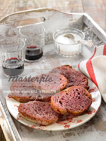 Sliced bread with red wine and sugar Sliced bread with red wine and sugar