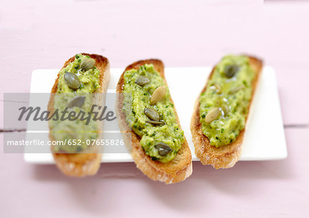 Seedy zucchini caviar on toast