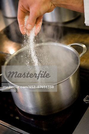 Sugar and water boiling in a cooking pot
