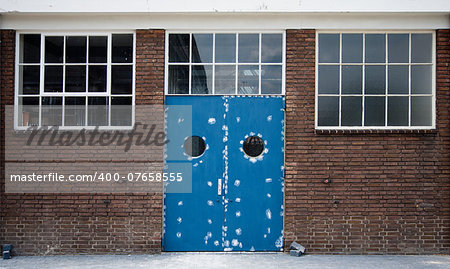 Blue door of an historic toothpaste factory in Amersfoort, the Netherlands