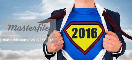 Composite image of businessman opening shirt in superhero style against bright sky