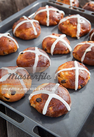 Easter hot cross buns on a baking sheet