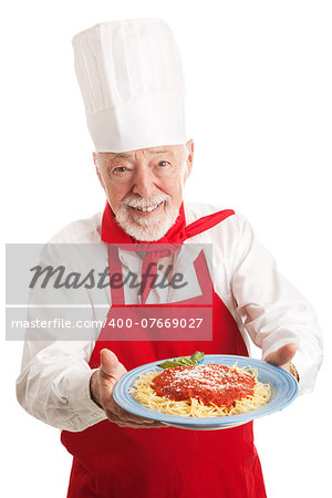 Italian chef holding a plate of spaghetti marinara over white background.