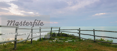 Panorama of a wooden fence on ocean shore in the morning  (South Shore, Nova Scotia, Canada)