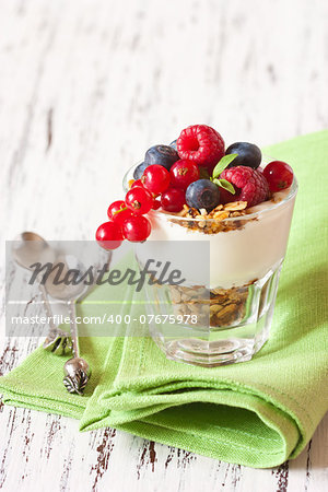 Fresh homemade granola with yogurt and berries for breakfast. Healthy food.