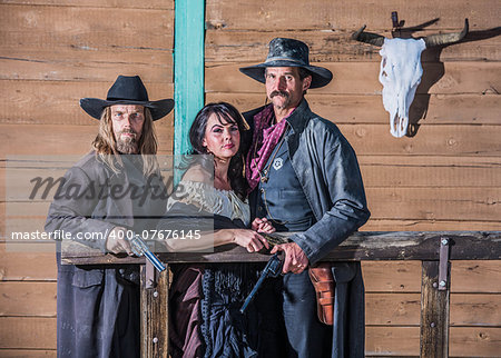 Portrait of three old west citizens