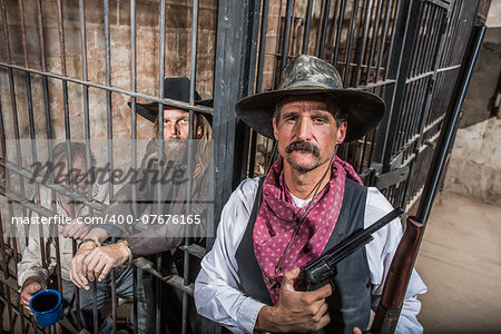 Sheriff Stands Stern in Front of a Jail Cell