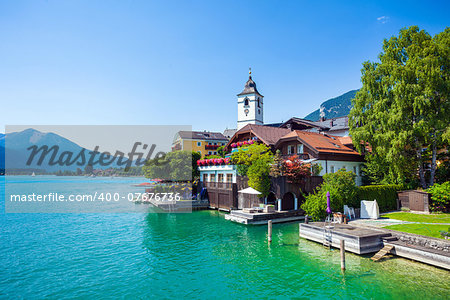 View of View of St. Wolfgang chapel and the village waterfront at Wolfgangsee lake, Austria