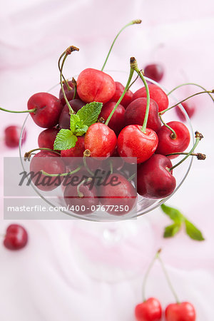 Fresh cherry in a glass, close up