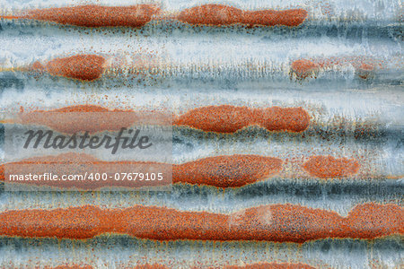 Rusty corrugated iron sheet as abstract horizontal background texture