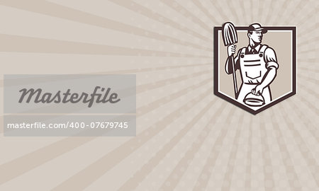 Business card showing illustration of a janitor cleaner worker holding mop and water bucket pail viewed from low angle set inside shield done in retro style.