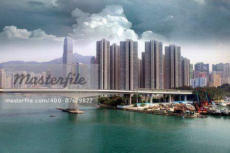 View of the residential area of Hong Kong on a background cloudy sky