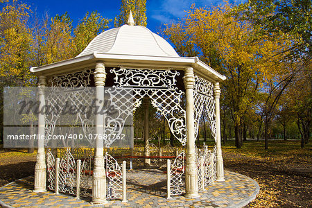 Outdoor gazebo in autumn park - Stock Image