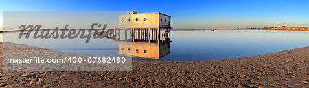 Panoramic of  historic life-guard bulding in Fuseta, at Ria Formosa conservation park, Algarve. Portugal